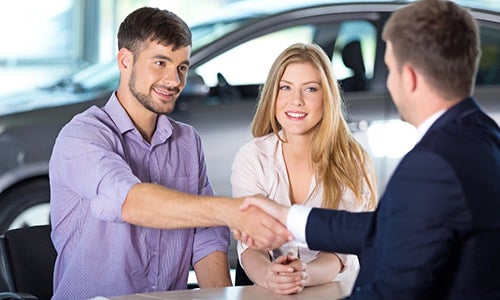 Suntrup Ford Kirkwood finance team helping a buyer with Ford financing options in St. Louis, Missouri
